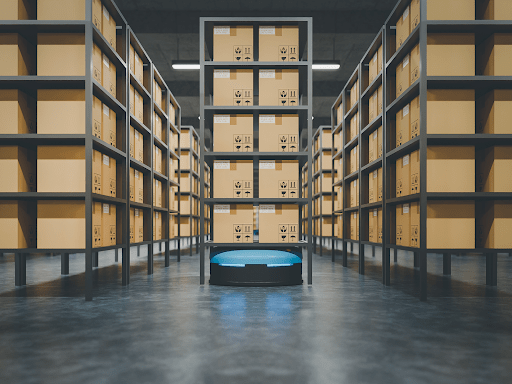 Some boxes in shelving in rows in a warehouse
