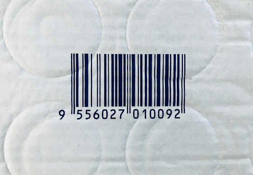 A barcode on white cardboard