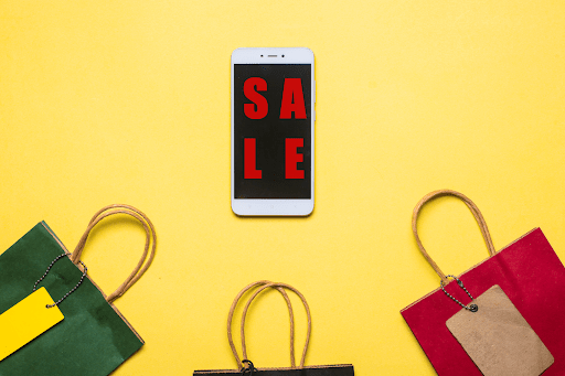 An image of paper bags and sale on a phone